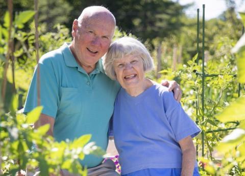 George and Cathy Wilson in a garden